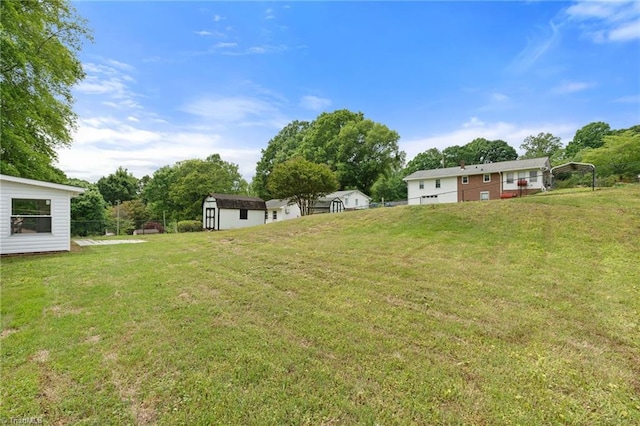 view of yard with a storage unit and an outdoor structure