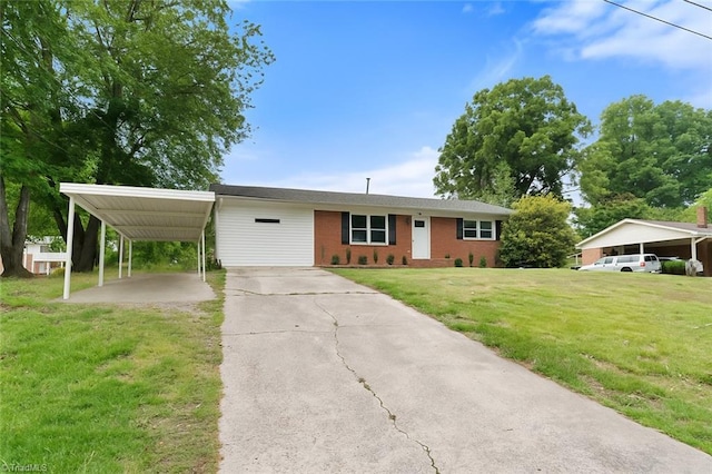 477 William Ln, Lexington, NC 27295 - view of front of property with a front lawn, an attached carport, brick siding, and driveway