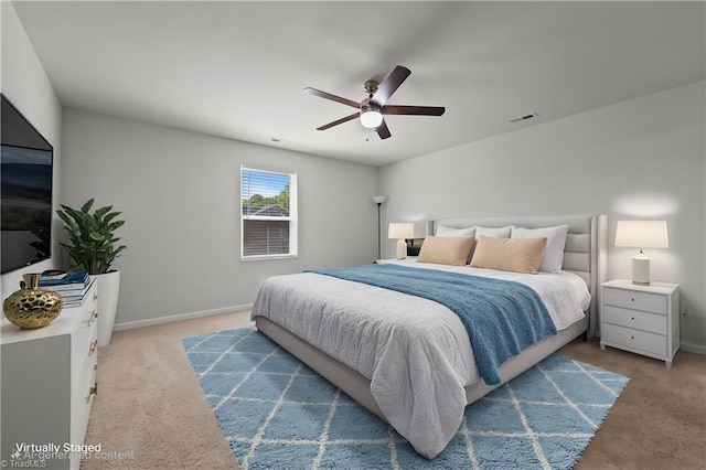 bedroom with carpet floors, baseboards, a ceiling fan, and visible vents