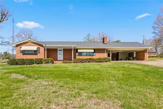 single story home featuring a front lawn and a carport