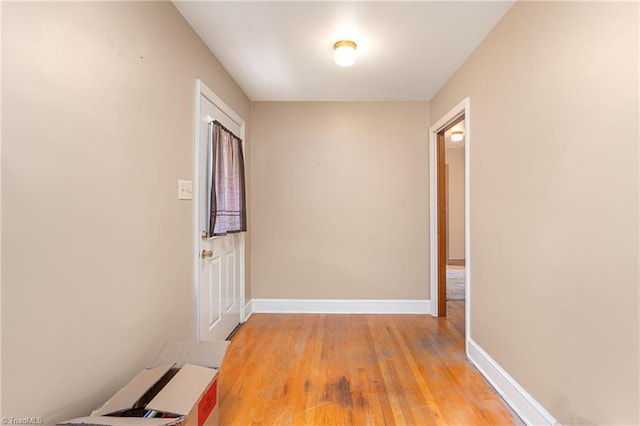 hall with light hardwood / wood-style flooring