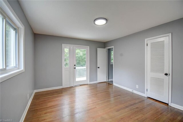 interior space with a wealth of natural light and light wood-type flooring