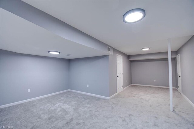 basement with light carpet