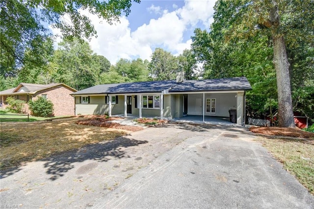 3422 Greenhill Dr, High Point, NC 27265 - ranch-style house featuring an attached carport and aphalt driveway