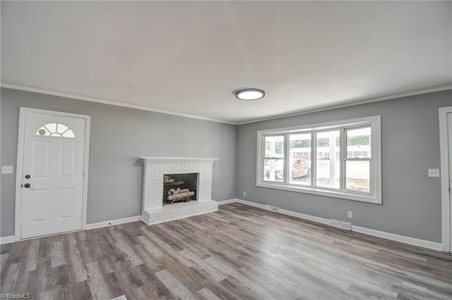 3422 Greenhill Dr, High Point, NC 27265 - unfurnished living room featuring baseboards, visible vents, and wood finished floors