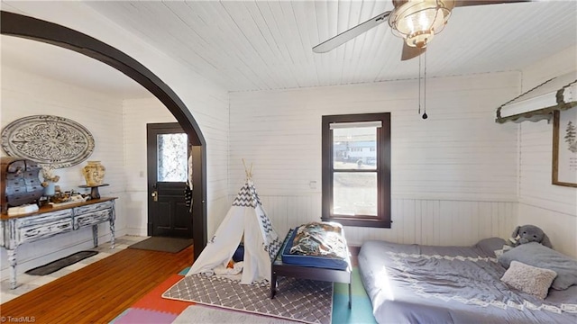 bedroom featuring hardwood / wood-style flooring and ceiling fan