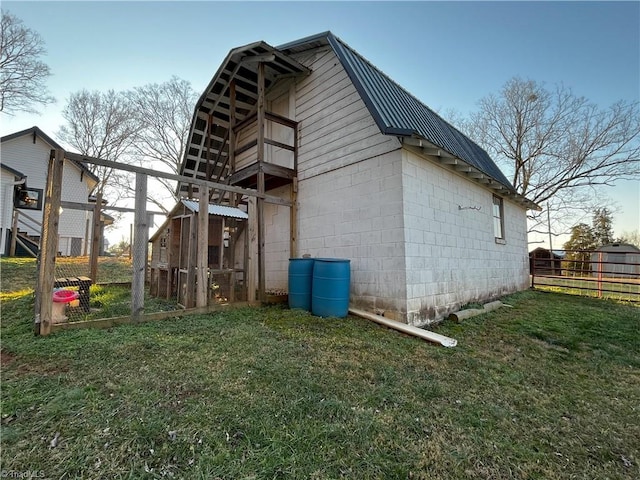 view of property exterior featuring a yard