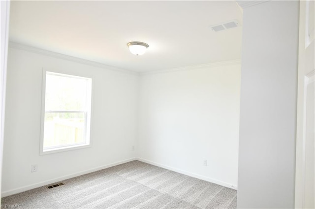 572 Kirby Bowman Rd, Siloam, NC 27047 - spare room with ornamental molding, baseboards, and light carpet