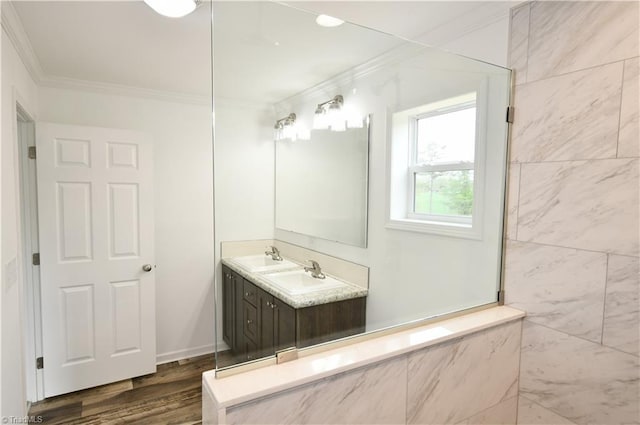 572 Kirby Bowman Rd, Siloam, NC 27047 - full bathroom featuring crown molding, double vanity, and wood finished floors