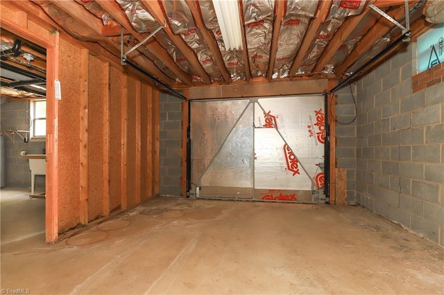 basement with concrete block wall