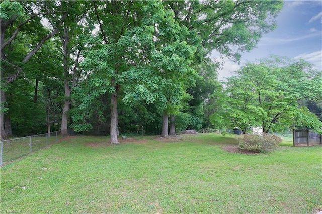 view of yard with fence