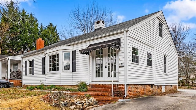 view of property exterior with french doors