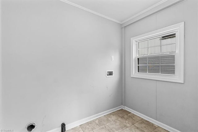 laundry room featuring washer hookup and crown molding