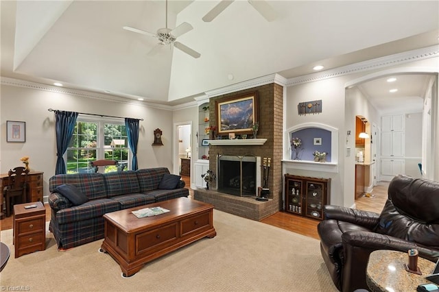 3805 Tangle Oak Dr, Clemmons, NC 27012 - living area featuring ceiling fan, recessed lighting, arched walkways, a brick fireplace, and vaulted ceiling