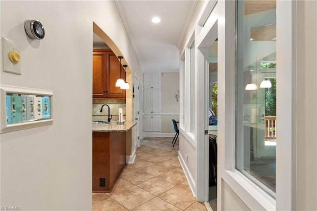 3805 Tangle Oak Dr, Clemmons, NC 27012 - corridor featuring light tile patterned flooring, arched walkways, and recessed lighting