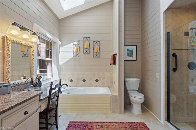 3805 Tangle Oak Dr, Clemmons, NC 27012 - bathroom with vaulted ceiling, a skylight, vanity, a bath, and a stall shower