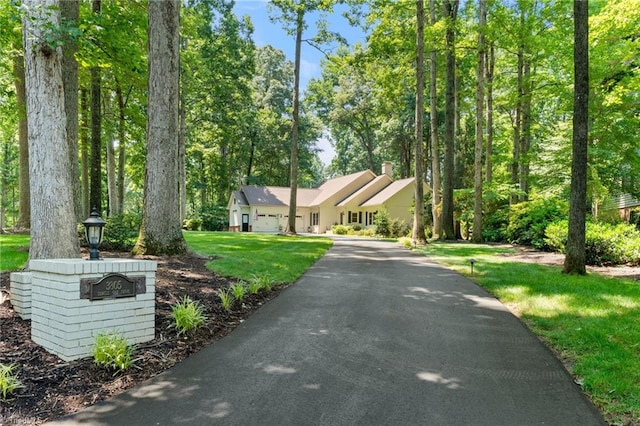 3805 Tangle Oak Dr, Clemmons, NC 27012 - view of front of house with a garage, asphalt driveway, and a front yard