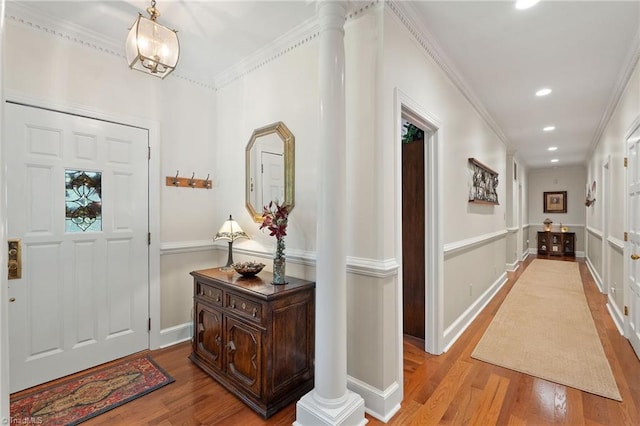 3805 Tangle Oak Dr, Clemmons, NC 27012 - foyer entrance featuring wood finished floors, recessed lighting, ornamental molding, and decorative columns