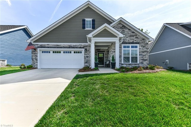 craftsman house featuring a front lawn, stone siding, and concrete driveway