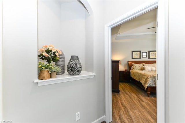 hall featuring wood finished floors