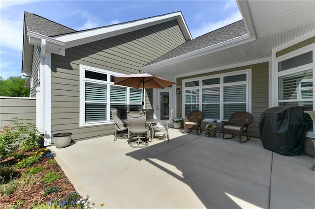 view of patio featuring grilling area and outdoor dining space
