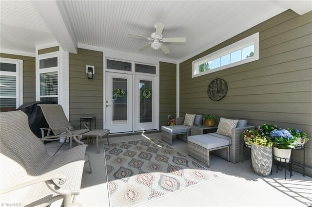 view of patio featuring a ceiling fan and french doors