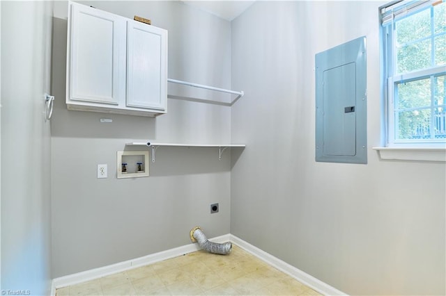 clothes washing area with washer hookup, electric panel, electric dryer hookup, cabinet space, and baseboards
