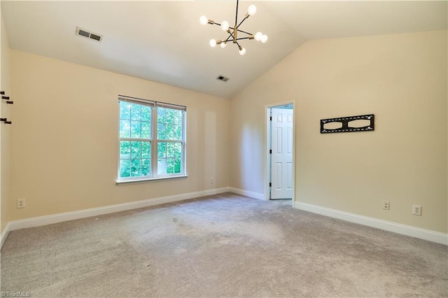 carpeted empty room with visible vents, baseboards, lofted ceiling, and a chandelier