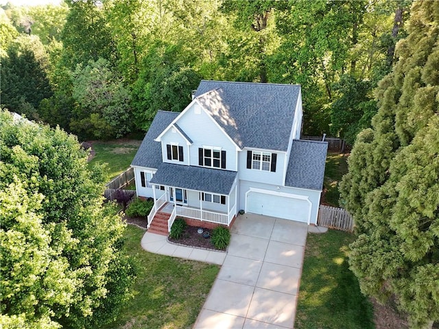 drone / aerial view featuring a view of trees