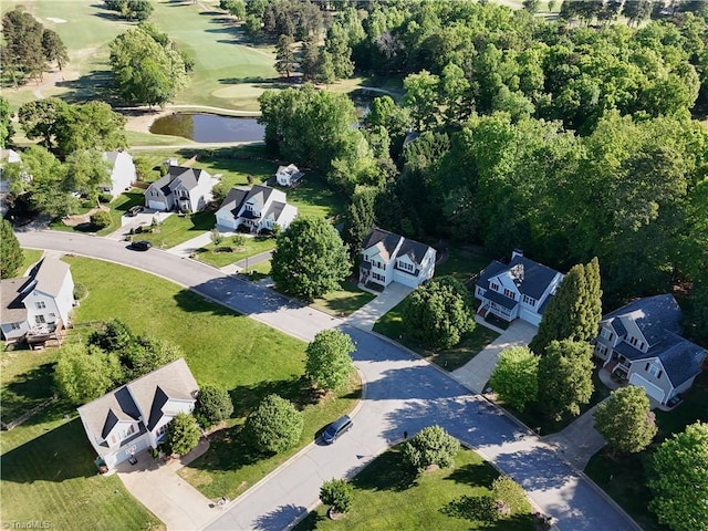 aerial view with a residential view and a water view