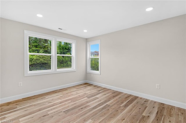 3630 Old Vineyard Rd, Winston-Salem, NC 27104 - unfurnished room featuring plenty of natural light, baseboards, light wood finished floors, and recessed lighting