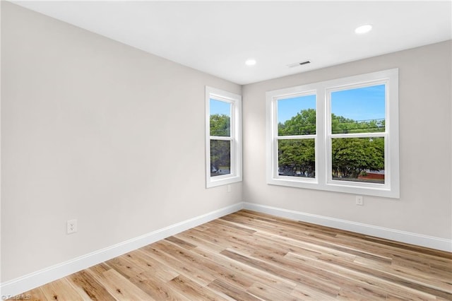 3630 Old Vineyard Rd, Winston-Salem, NC 27104 - empty room with baseboards, light wood finished floors, and recessed lighting