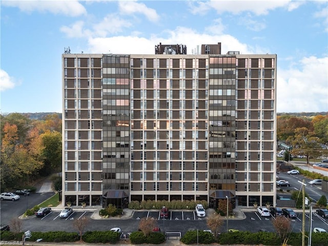 1101 N Elm St Unit 904, Greensboro, NC 27401 - view of apartment building / complex featuring uncovered parking