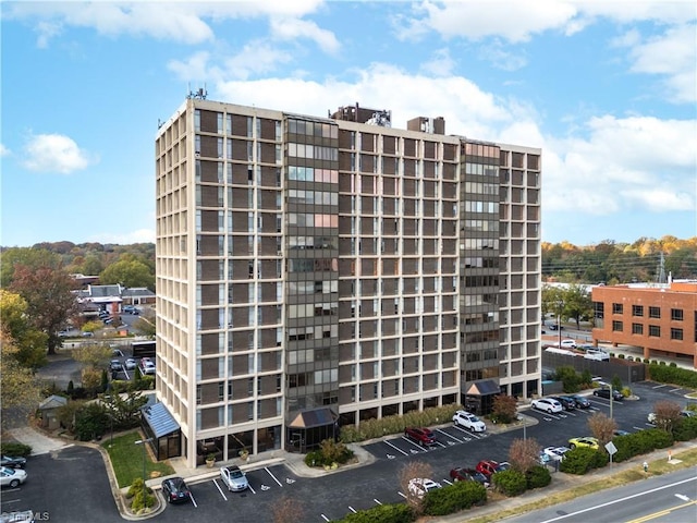 1101 N Elm St Unit 904, Greensboro, NC 27401 - view of apartment building / complex featuring uncovered parking