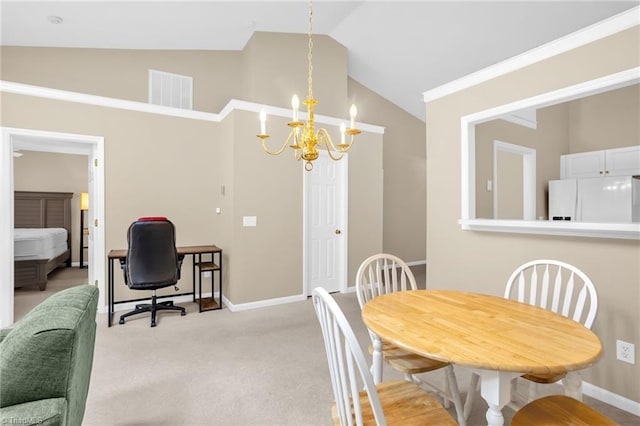 dining space with a chandelier, lofted ceiling, light carpet, and baseboards