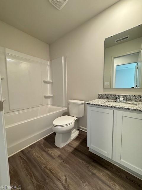 2210 Cranberry Way, Salisbury, NC 28147 - bathroom with wood finished floors, vanity, and shower / bathtub combination