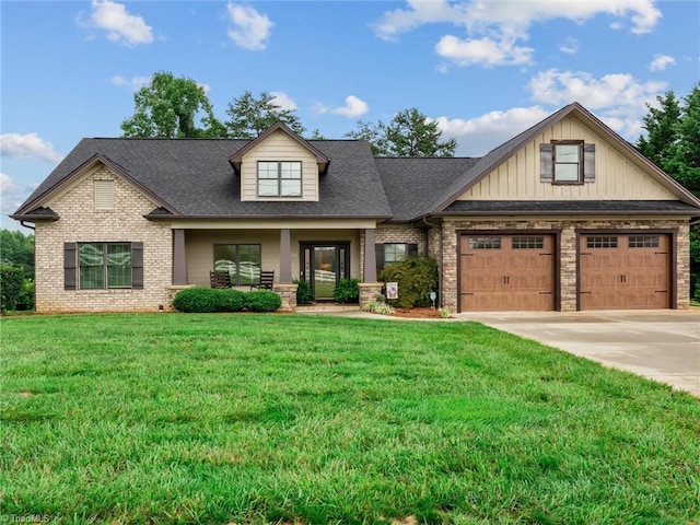 view of front facade with a garage and a front yard