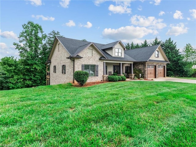 view of front of house featuring a front lawn and a garage