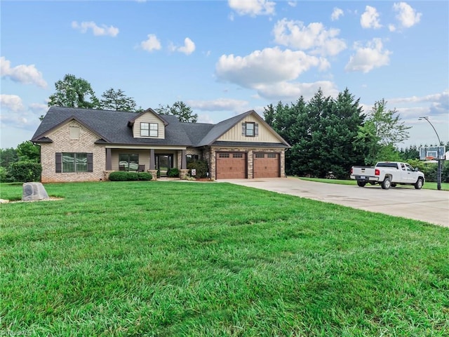 view of front of property with a garage and a front lawn