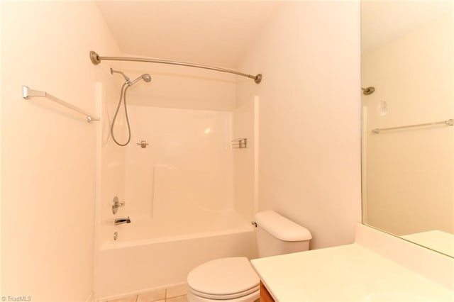 bathroom with shower / bathing tub combination, vanity, toilet, and tile patterned floors