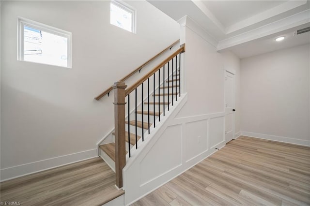 stairway featuring hardwood / wood-style flooring