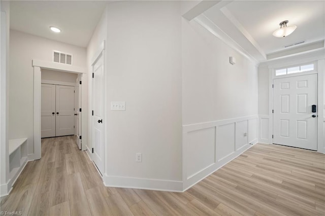 foyer entrance featuring light wood-type flooring