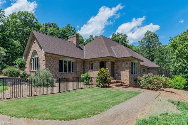 view of front of home with a front yard