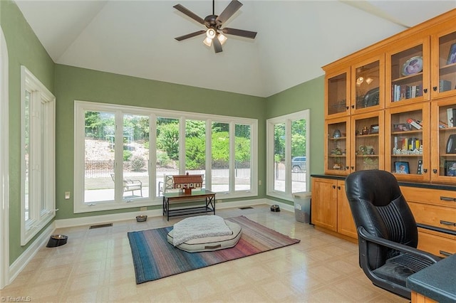 office featuring ceiling fan and high vaulted ceiling