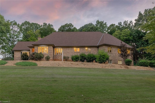 view of front of house with a lawn