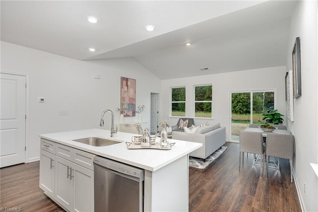 kitchen with sink, a center island with sink, stainless steel dishwasher, dark hardwood / wood-style flooring, and white cabinets