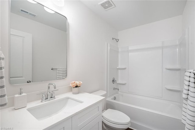 full bathroom featuring  shower combination, vanity, and toilet