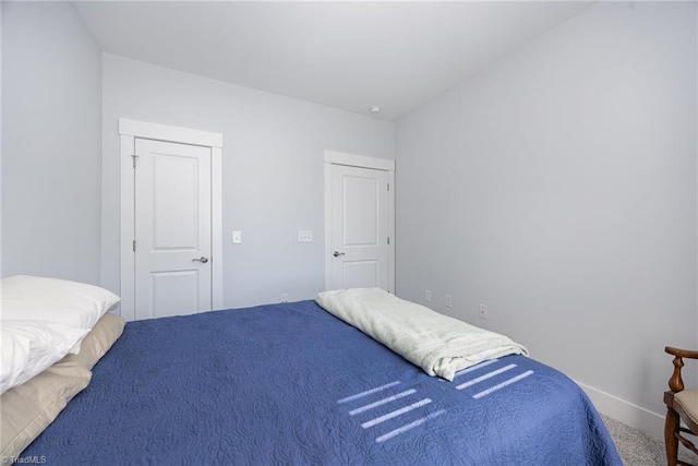 3903 Sudley Pt Unit 18, Jamestown, NC 27282 - carpeted bedroom with baseboards