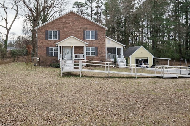 view of front facade featuring a sunroom