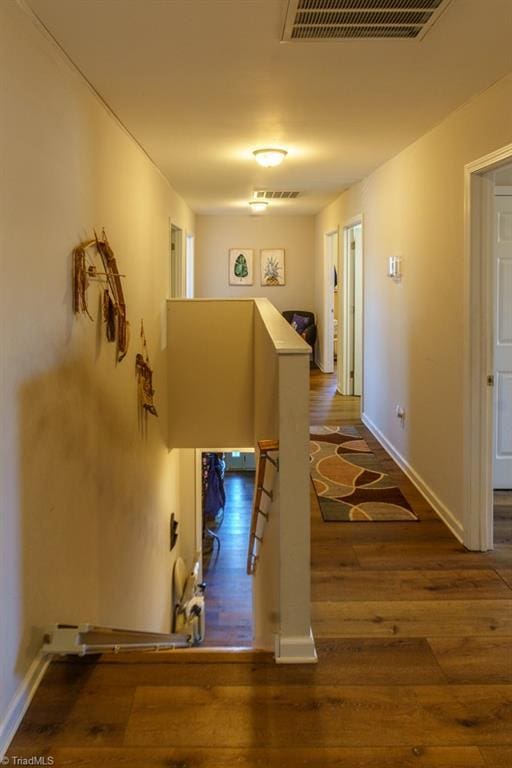 hall featuring dark wood-type flooring